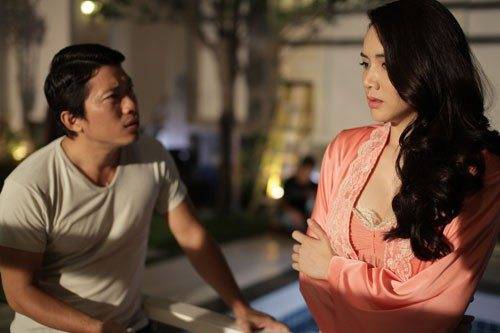 Diễn viên Kinh Quốc và Trang Nhung trong một cảnh phim.
